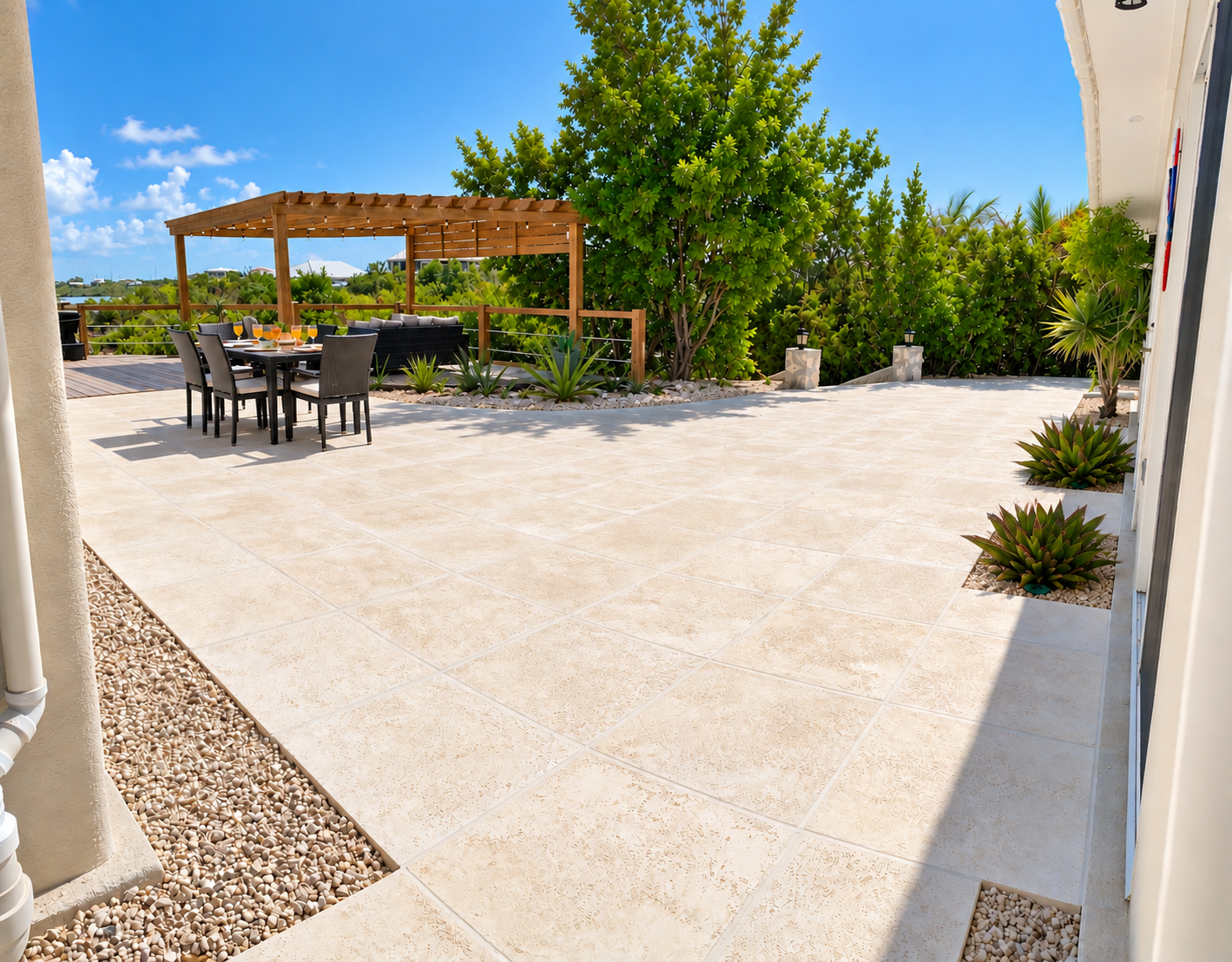 A spacious, sun-filled patio provides plenty of room for kids to play, run around, and enjoy outdoor time. A pergola and comfortable seating nearby, parents can relax while keeping an eye on the fun.